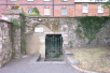 Behind the steps , this is the only visible section of the city's Roman wall that remains.