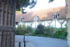 The Pilgrims Hall is a flint rubble walled hall, open to the public, that has the oldest surviving hammer-beam roof in England, possibly dating from 1290.