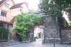 Another view of Priory Gate, and the tiny Porters Lodge perched on top.