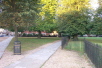 Follow the path around the North side of the Cathedral, toward Morley College.