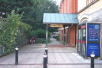 Turn into Abbey Passage, at the side of the Guildhall.