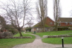 A view across the lower terrace and the site of the Guest House which spanned the Mill Stream to the left of the photo.