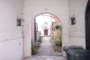 Through the archway stands the former Catholic chapel of St Peter, now called Milner Hall in memory of the Rev John Milner who built it in 1792